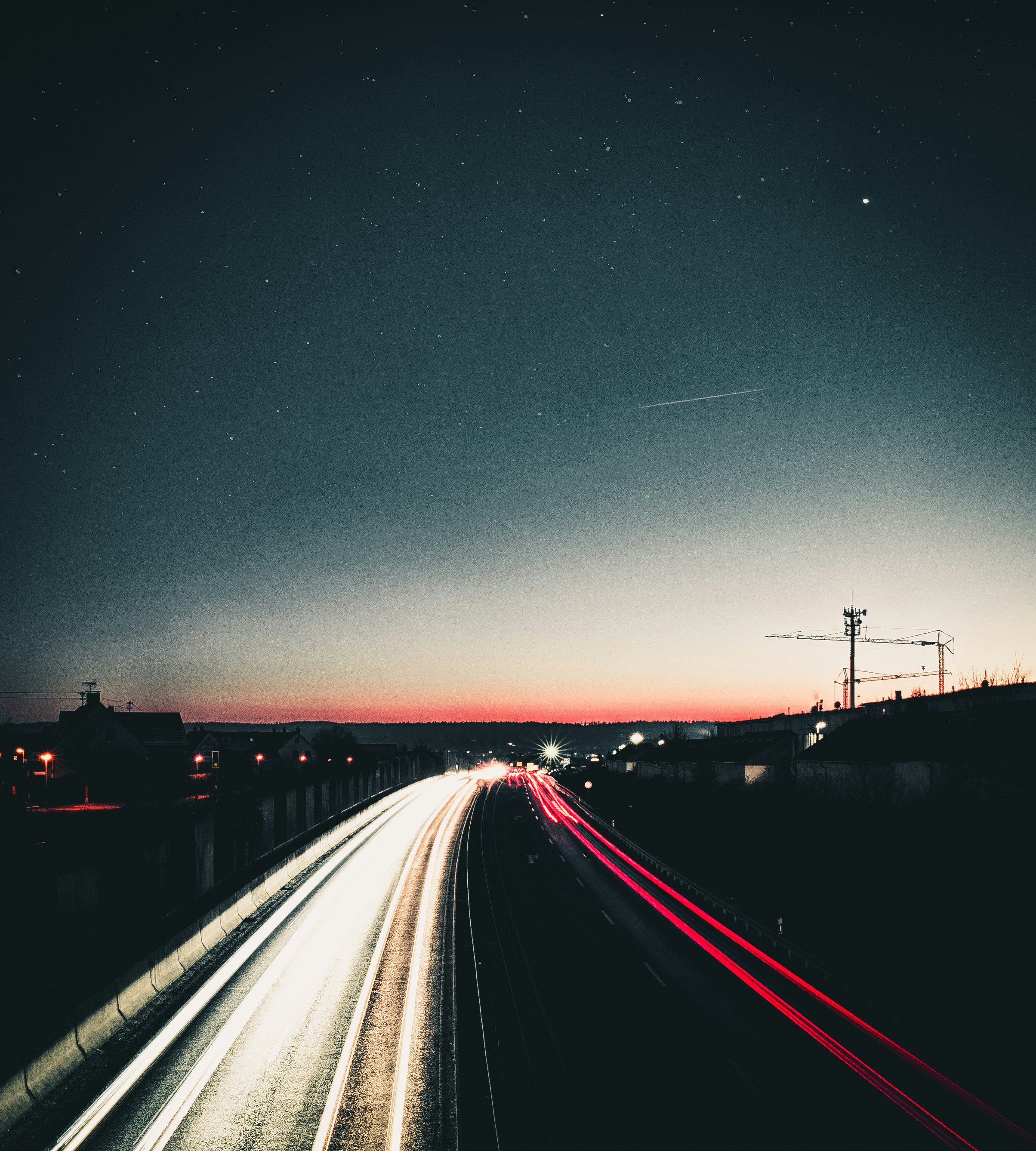 time lapse photography of cars on road during night time